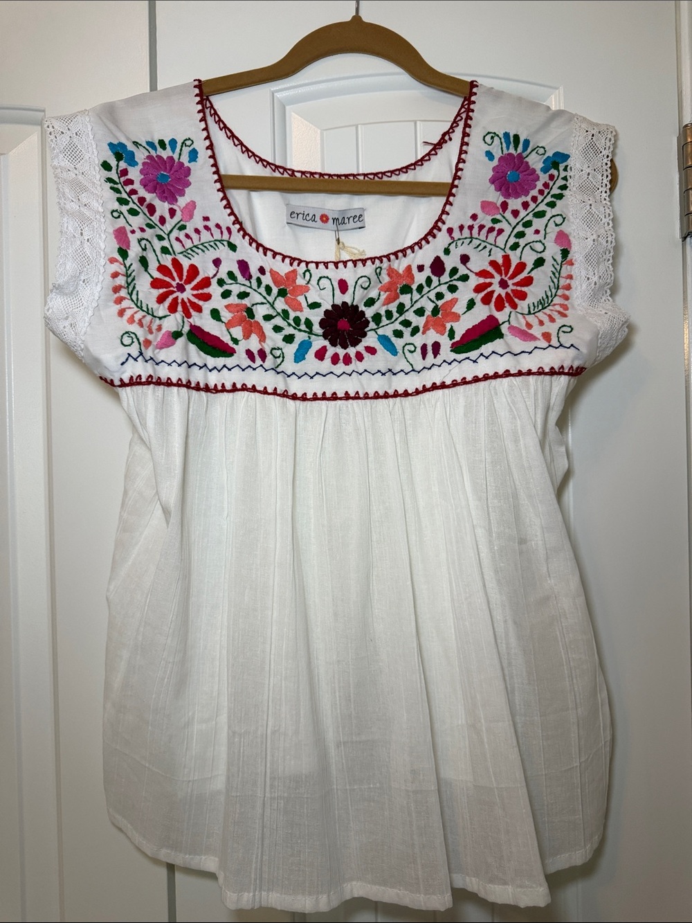 Embroidered White Peasant Blouse with Colorful Floral Detail